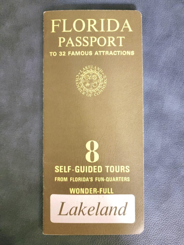 Vintage 'Florida Passport' brochure from the Lakeland Chamber of Commerce, promoting 32 famous attractions in Florida. The cover features gold lettering on a brown background, advertising '8 self-guided tours from Florida’s fun-quarters' and emphasizing 'Wonder-Full Lakeland.' A nostalgic piece of Florida tourism history, likely from the mid-20th century.