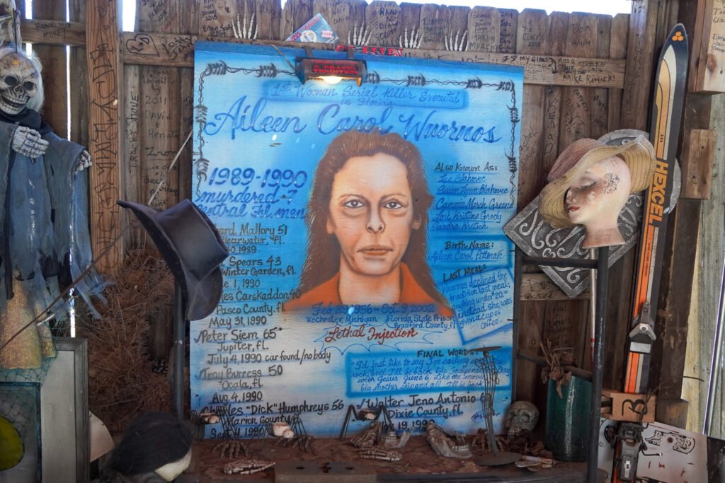 The Aileen Wuornos shrine at the Last Resort Bar in Port Orange, Florida. This eerie memorial, featuring a painted portrait and case details, honors the infamous serial killer who was arrested at this bar in 1991. Surrounded by skulls, mannequins, and vintage memorabilia, the display attracts true crime enthusiasts and curious visitors to this historic dive bar.